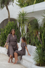 Summer-ready bronze Camila swim set with Lia wrap skirt, modest and stylish beach outfit