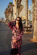 Lifestyle shot of the modest Satin Shirt in Pink Floral print, paired with the matching skirt for a chic, modest look.