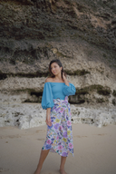 Back view of the Ana Swim Skirt in floral print, highlighting the modest length and chic design for a complete swimwear look.