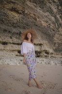 Side view of the Ana Swim Skirt in floral print, showcasing its elegant and modest design, perfect for pairing with your favorite swimsuit.