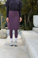 Modest active skirt in muted plum created for Jewish women combining movement, comfort, and modest fashion.