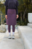 Modest active skirt in muted plum created for Jewish women combining movement, comfort, and modest fashion.