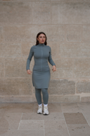 Side view of the sage green 20-inch modest sport skirt with integrated leggings, combining style and function for modest activewear.