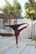 Modest athletic skirt with built-in legging in muted wine color, suitable for covered sportswear for women.
