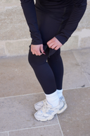 The 20-inch modest sport skirt with integrated leggings styled with accessories, a perfect choice for modest Muslim activewear.