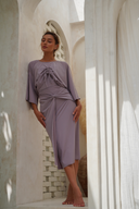 Mia mauve swimsuit set with adjustable straps and removable cups, paired with a modest top and wrap skirt.